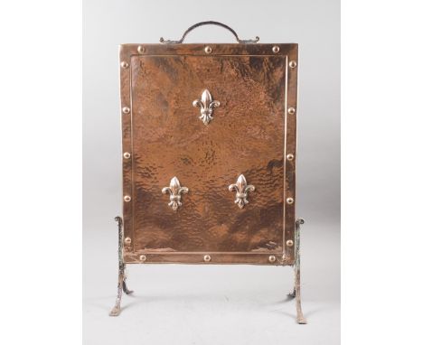 A 19th century oval leather bucket, fitted metal liner, 13" high, and a hammered copper firescreen decorated fleur-de-lys 