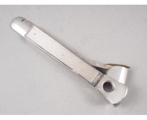 An engine turned silver cigar cutter 