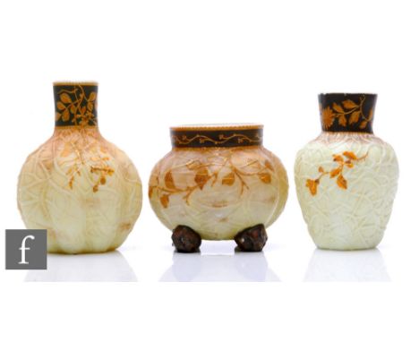 A late 19th Century Harrach vase of fluted globe and shaft form with a tall collar neck and random relief moulded veined deco