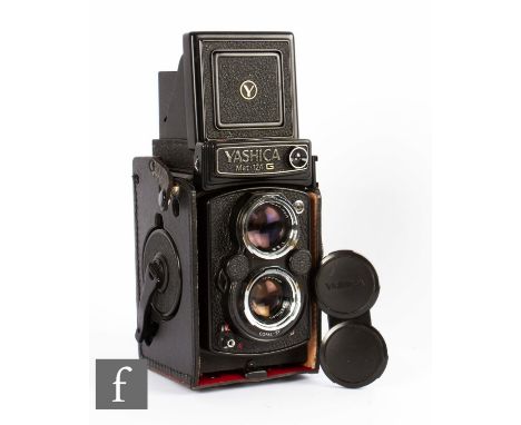 A Yashica Mat-124 G - Medium format twin lens reflex film camera, circa 1970, serial number 138684. 