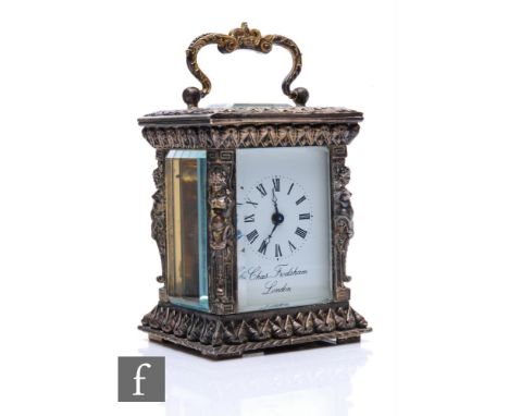 A Chas. Frodsham miniature carriage clock, the silvered four glass and cast case adorned with&nbsp;caryatids, the white ename