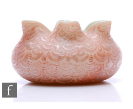 A late 19th Century Stevens &amp; Williams Tapestry pattern bowl of compressed ovoid form with a waved rim, cased in satin cl