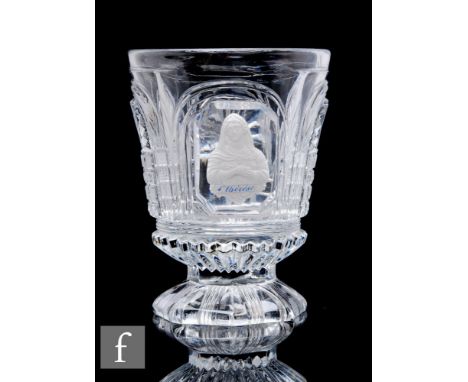 A mid 19th Century Baccarat pressed glass footed beaker, circa 1840, the cylinder bowl decorated with panels of fan cut arche