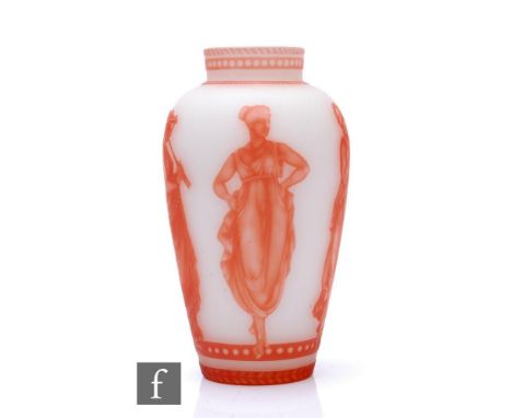 A late 19th Century cameo glass vase of ovoid form with collar neck, cased in deep amber over opal and cut with three classic