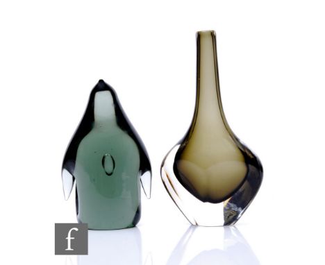 A mid 20th Century Holmegaard glass figure of a stylised penguin with an internal air tear in deep pewter, dated 1961, engrav