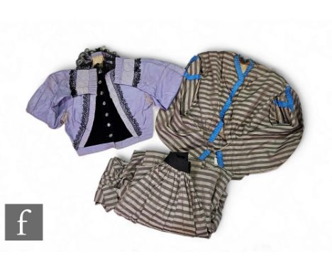 A Victorian lady's two piece dress, the jacket with blue ruffle trim over grey and silver stripe fabric and full length pleat