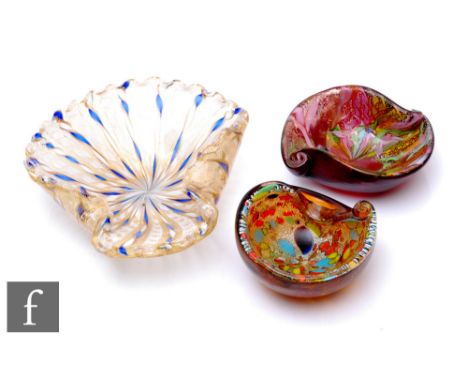 A 20th Century Murano glass bowl, of shell form, decorated internally with alternating opal latticinio and opal and blue twis