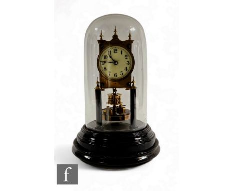 An early 20th Century 265 day mantle clock by Gustave Becker, Arabic dial, stamped to movement, on ebonised pillars and circu