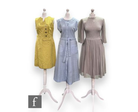 Three 1960s vintage dresses, comprising sleeveless yellow shift mini dress with off centre button detail and patch pocket, to