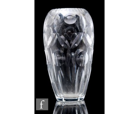 A 1950s clear cut crystal glass vase by Waterford, the tall ovoid body with polished printie panels and mitre lozenge cuts in