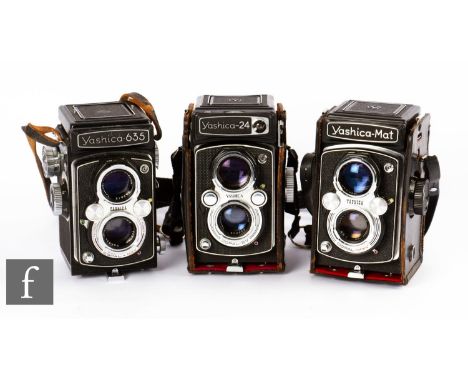 A collection of three Yashica medium format twin lens reflex film cameras, circa 1970s, to include Yashica 635, Yashica Mat a