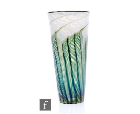 A contemporary Lundberg Studios glass vase, of tapering sleeve form, decorated with pulled opal trailing before iridescent gr