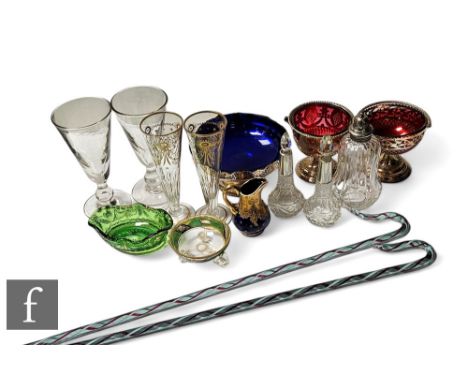 A collection of assorted late 19th and early 20th Century glass wares, to include two Edwardian hallmarked silver mounted cut