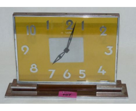 Jaeger Le Coultre: An Art Deco glass and chromium plate mantle clock. c.1930. 7'' high. Movement probably a replacement and t