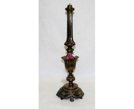 A brass lamp base, fluted and moulded with leaves and paterae. 21½'' high