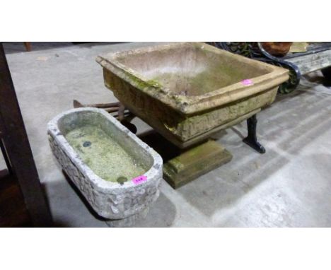 A garden planter and a trough