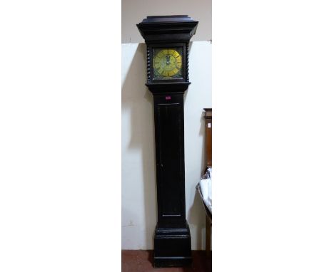 A 17th century lantern clock with weight driven movement, verge escapement and bob pendulum in a stained pine longcase with b