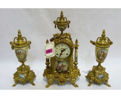 A continental gilt brass clock garniture of recent manufacture, decorated with inset painted ceramic plaques, the 8 day movem