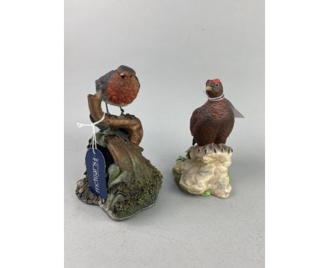 SIX CERAMIC AND RESIN MODELS OF BIRDS, the tallest 18cm high (6)