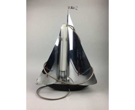 ART DECO CHROME LAMP, modelled in the form of a yacht, with a black lacquered metal hull, 49cm high