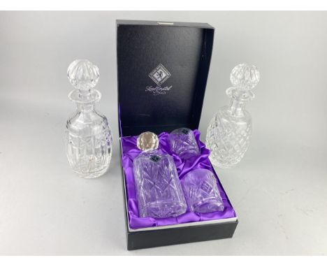 EDINBURGH CRYSTAL DECANTER AND TWO GLASSES, along with three other glass decanters