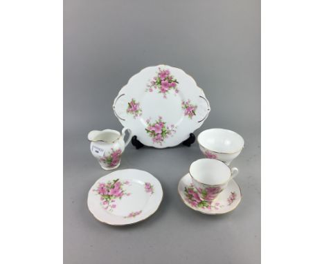 ROYAL YORK FLORAL AND GILT PART TEA SERVICE, nine cups, twelve side plates, eleven saucers, sandwich plate, cream and sugar, 