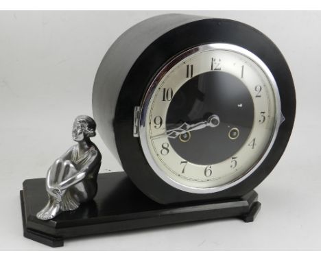 In the Art Deco style, a 20th century mantel clock, having 8 day cylinder movement. 