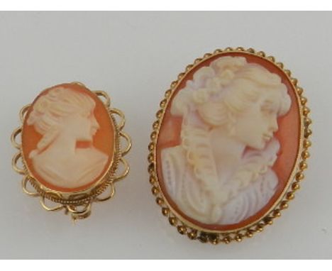 A yellow gold mounted Victorian cameo brooch, set portrait cameo of a lady, together with a small yellow gold mounted cameo b