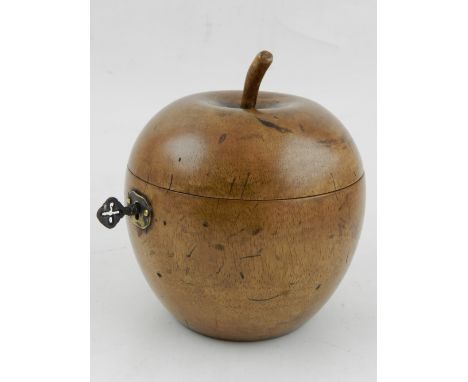 A fruitwood tea caddy in the form of an apple. 