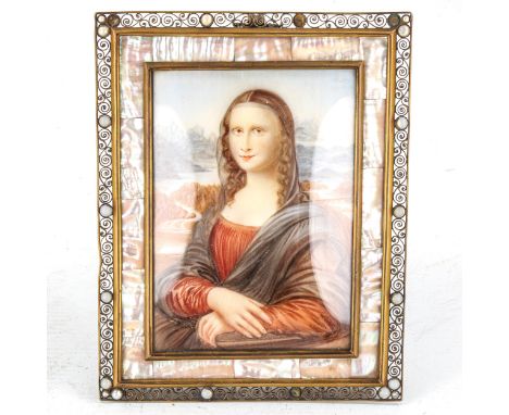 An early 20th century painted portrait on ivorine after Leonardo, The Mona Lisa, in ornate brass filigree frame with mother-o