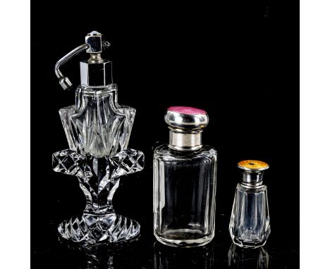 2 silver and enamel-topped toilet jars, and an Art Deco cut-glass atomiser perfume bottle with chrome plate top (3) 