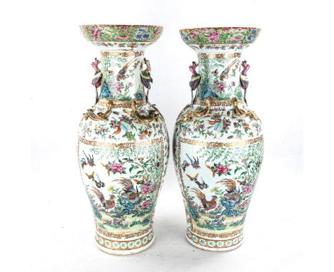 A pair of Chinese 19th century famille rose porcelain vases, with dragon and bird figures to the neck, and hand painted ename
