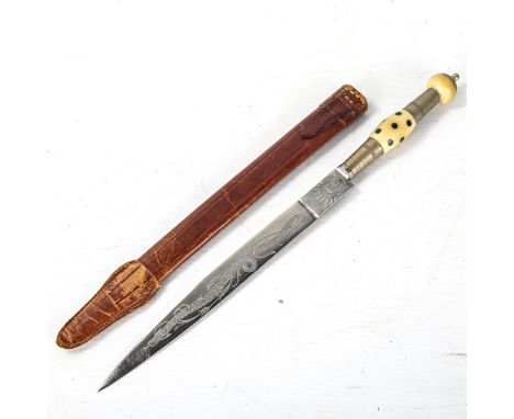 A Vintage Gaucho knife, blade engraved Venenoza, composition handle with leather scabbard, length 32cm 