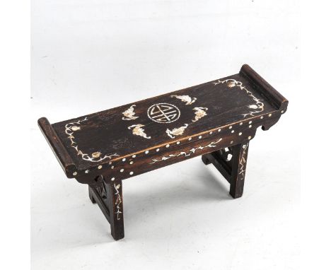 A Chinese hardwood and mother-of-pearl inlaid stand, in the form of an altar table, length 34cm 