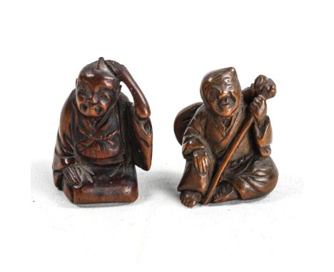 2 similar Japanese carved wood netsuke, in the form of seated figures, Meiji Period, height 4cm 