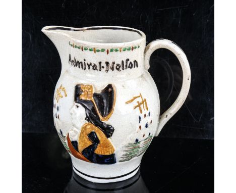 A Prattware Admiral Nelson and Captian Hardy ceramic jug, circa 1805, relief moulded profiles, height 16cmCrazed all over wit