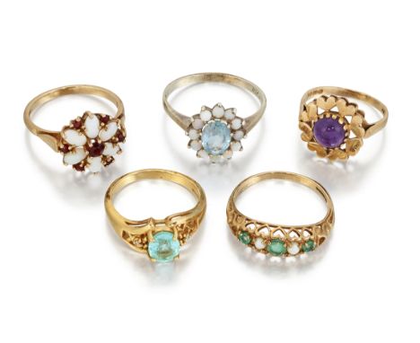 FIVE GEMSET RINGS, to include an 18ct aquamarine ring with diamond highlight shoulders, size N; a 9ct opal and garnet cluster