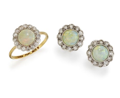 AN 18CT AND PLATINUM OPAL AND DIAMOND CLUSTER RING AND A PAIR OF MATCHED EARRINGS, the round opal cabochon surrounded by sing