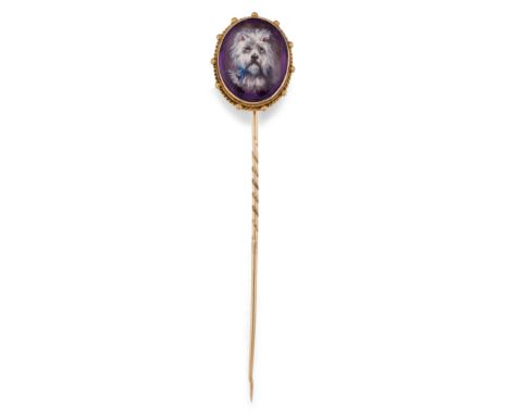 A PAINTED AMETHYST STICK PIN, the oval amethyst painted with a West Highland Terrier with a blue ribbon, collet mounted with 