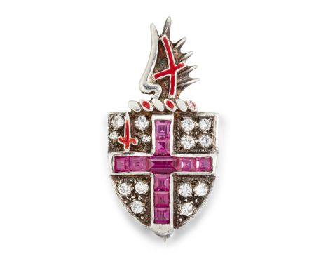 A SILVER ARMORIAL BROOCH BY TOYE, KENNING AND SPENCER, the shield set with synthetic rubies and white hardstones, with red en