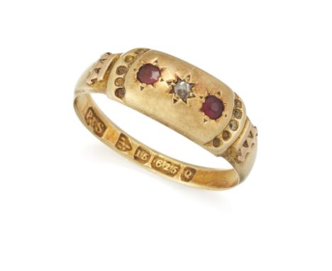 A 15 CARAT GOLD RUBY AND DIAMOND RING, with a gypsy set rose cut diamond and small ruby to either side, with tapered shoulder