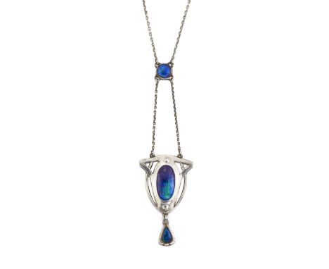 AN EARLY 20TH CENTURY SILVER AND ENAMEL PENDANT BY CHARLES HORNER, the oval blue-green enamel panel set within a silver frame
