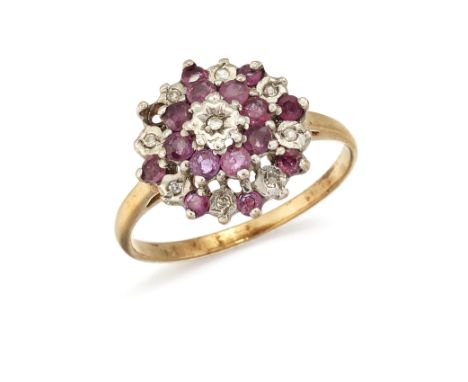 A 9CT RUBY AND DIAMOND CLUSTER RING, all set in white gold to a plain band of yellow gold, stamped '375' with Birmingham assa