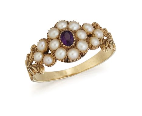 AN EARLY 19TH CENTURY AMETHYST AND SPLIT PEARL RING, the central oval amethyst, surrounded by split pearls, with a further th