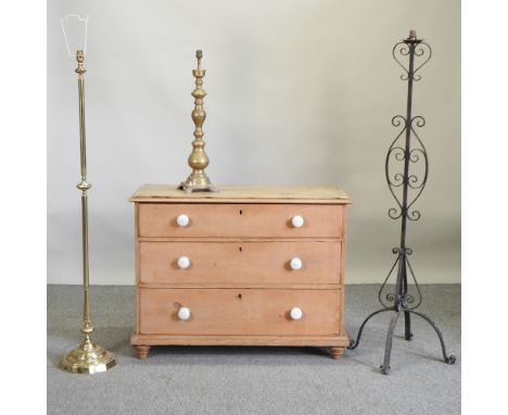 An antique pine chest of drawers, 102cm, together with a brass standard lamp, 157cm high, another and a brass table lamp (4)