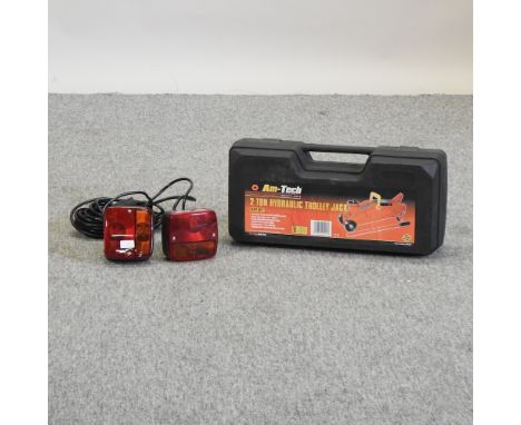 A magnetic trailer light set, together with a trolley jack, cased