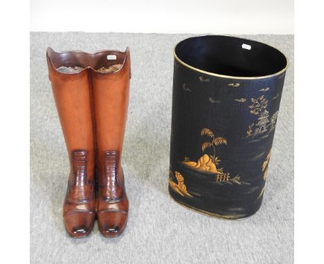 A stick stand, in the form of a pair of riding boots, together with a tole stick stand, 47cm high