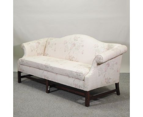 A Georgian style cream upholstered hump back sofa, 196cm