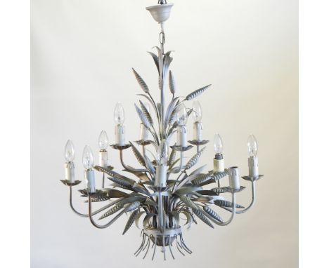 An ornate cream painted metal chandelier, 64cm diameter