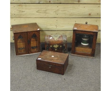 An Edwardian oak humidor, 27cm, together with another, a 19th century walnut domed tea caddy and a rosewood box